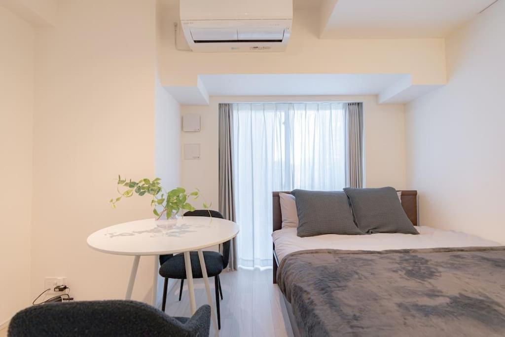 Unito Higashishinjuku Apartamento