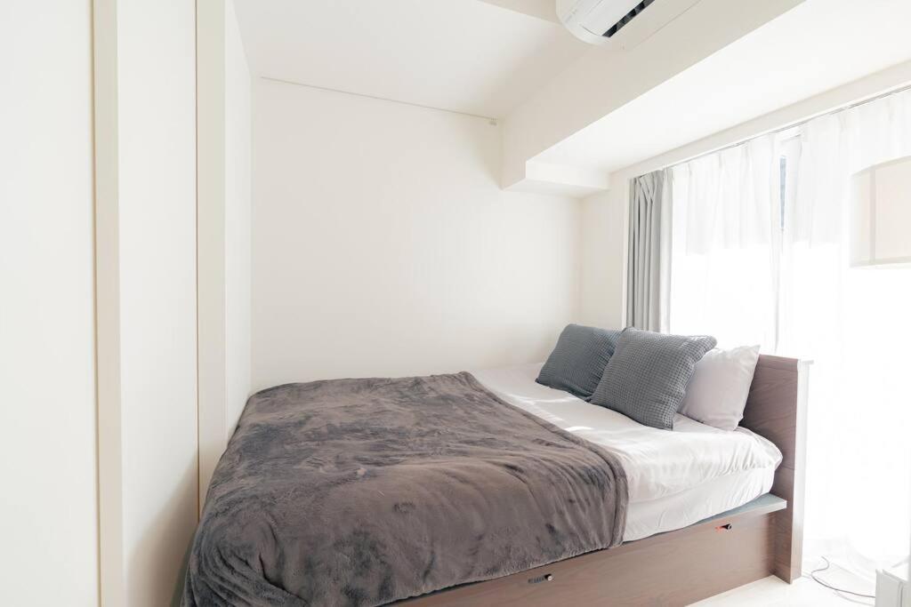 Unito Higashishinjuku Apartamento *